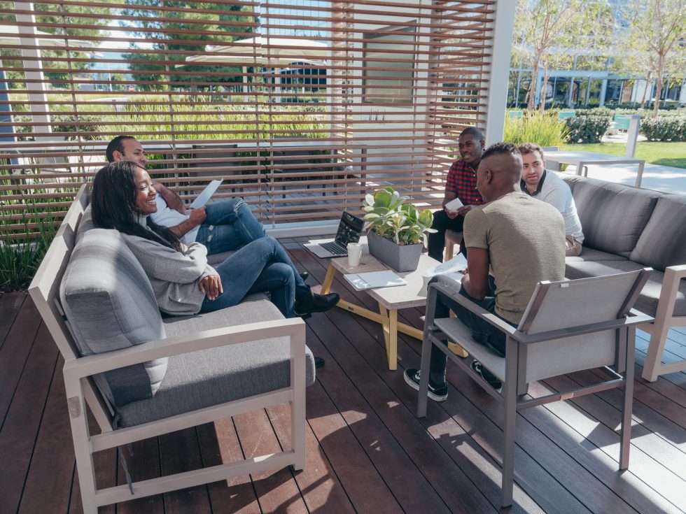 Employees Meeting in Outdoor Space 980x735 1